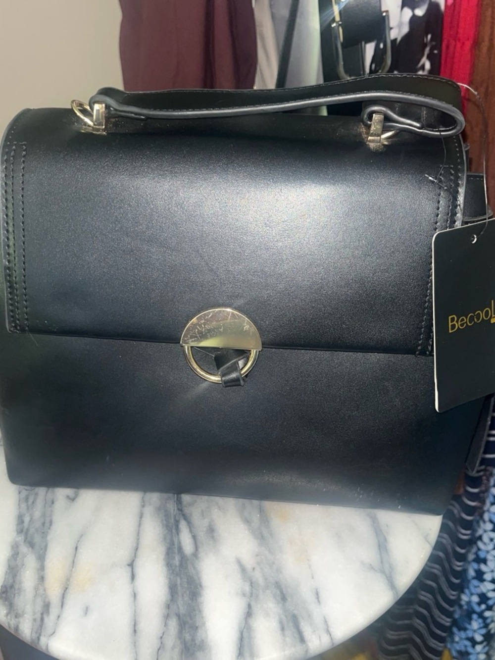 BE COOL Black Top-Handle Satchel with Gold Ring Closure